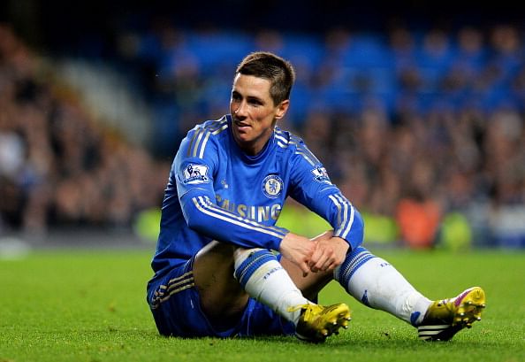 Fernando Torres of Chelsea reacts after being tackled during the Barclays Premier League match between Chelsea and Tottenham Hotspur at Stamford Bridge on May 8, 2013 in London, England. (Photo by Shaun Botterill/Getty Images)